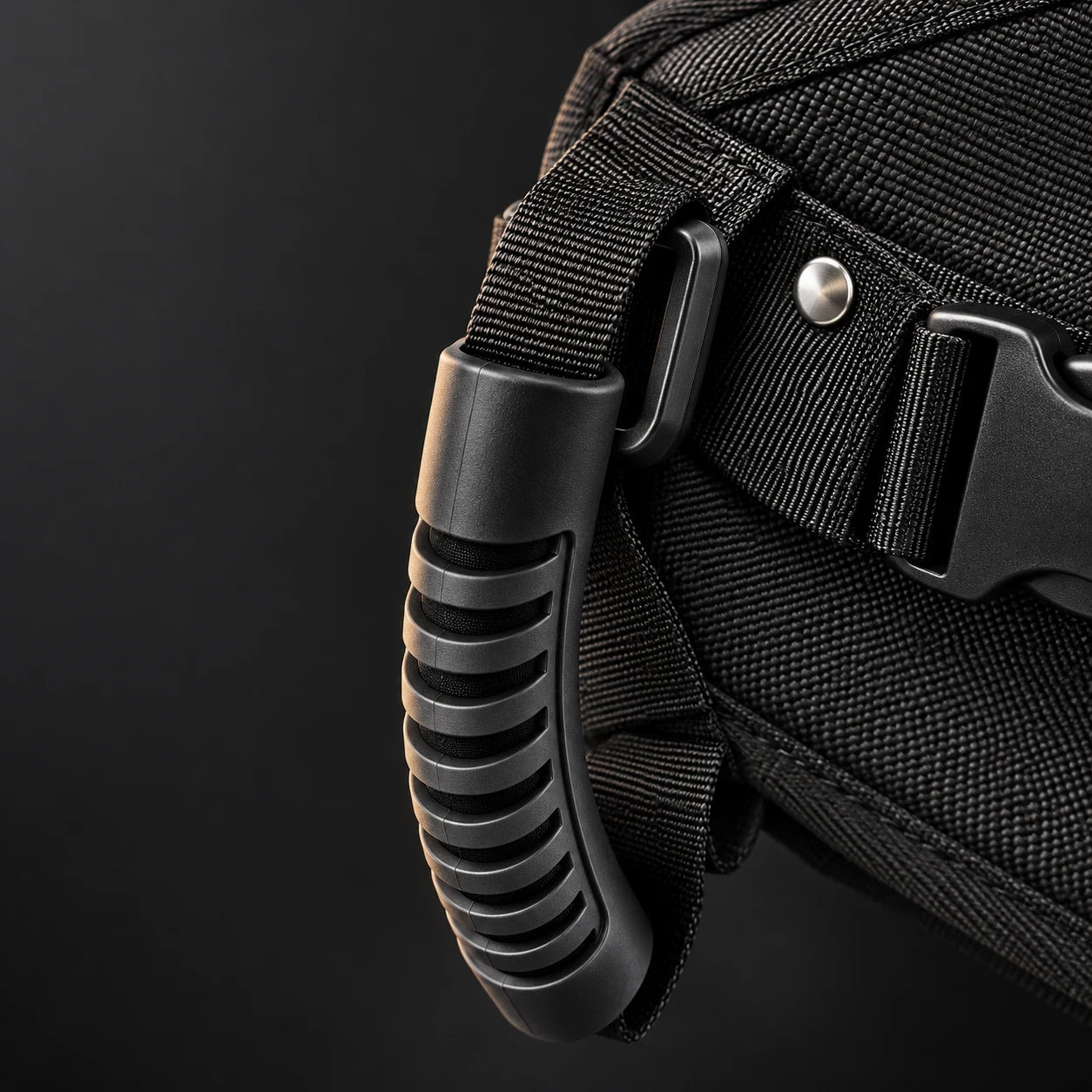 Close-up of the textured handle and woven strap
